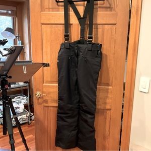 Black Volkl ski pants. Size 10